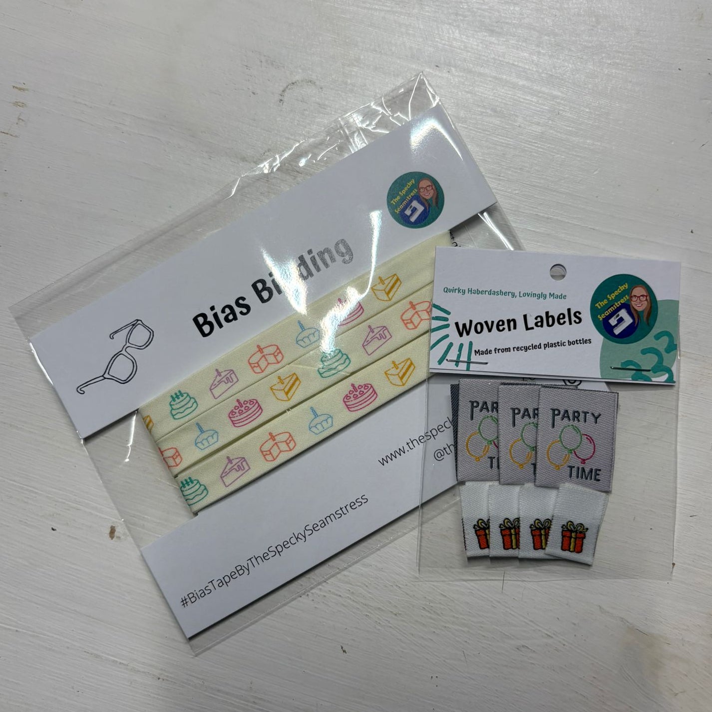 A pack of Piece of Cake and a pack of mixed Party Time and Mini Present labels. 